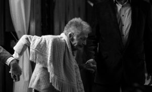 Miami Senior wrapped in a shawl